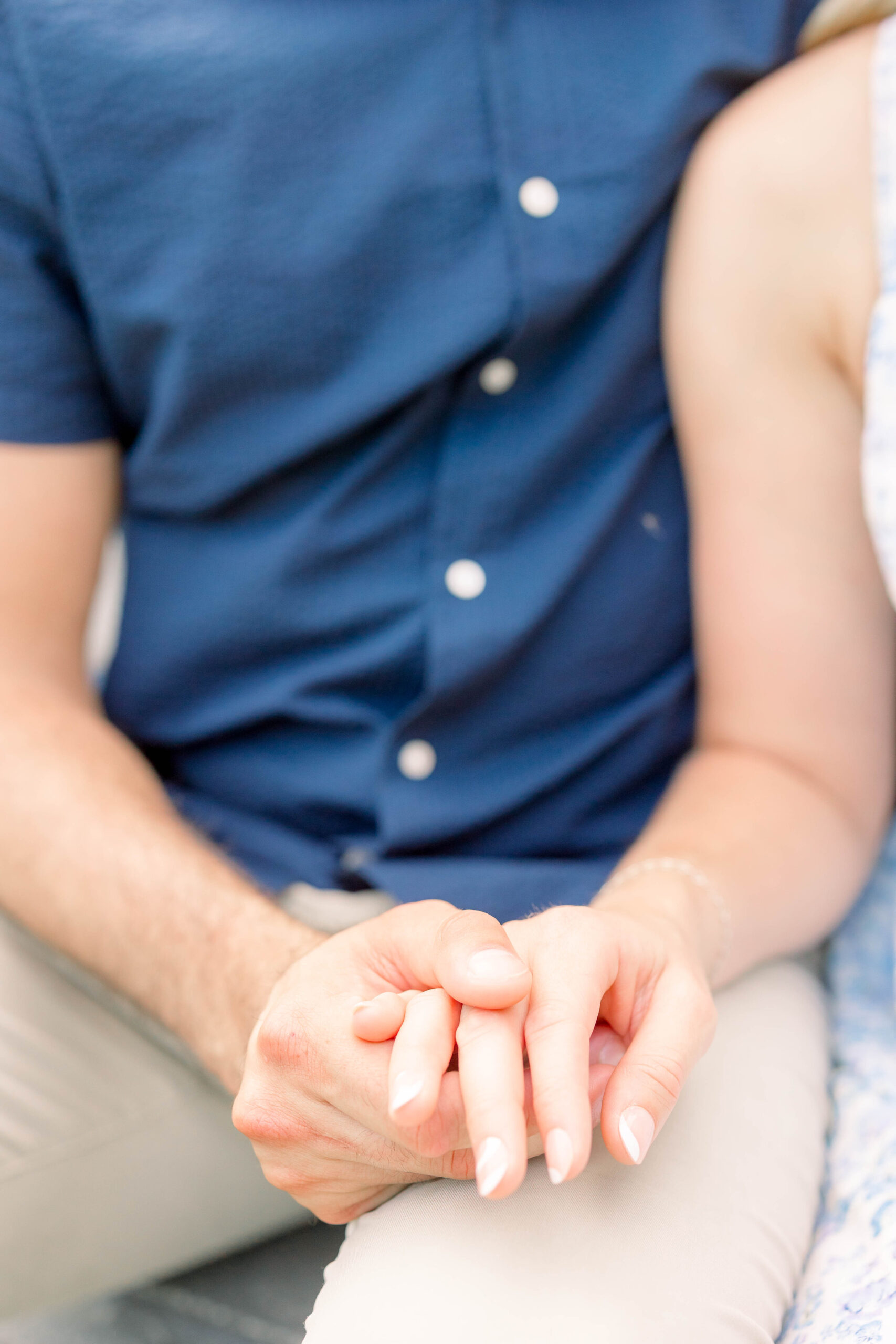 Newport Wedding Photographer and Videographer | Serving CT, RI, Massachusetts, and Surrounding New England Areas | Couple holding hands