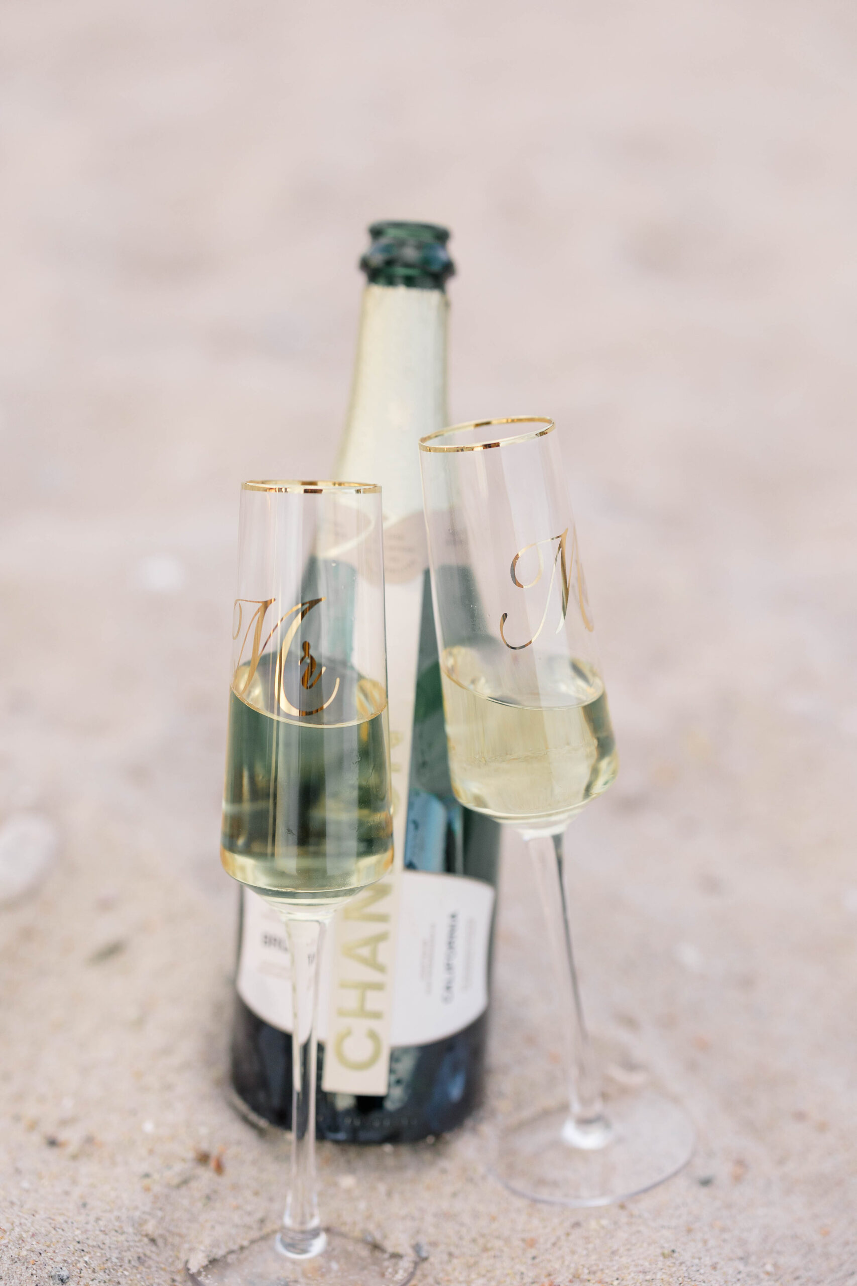 Newport Wedding Photographer and Videographer | Serving CT, RI, Massachusetts, and Surrounding New England Areas | Champagne with two champagne glasses