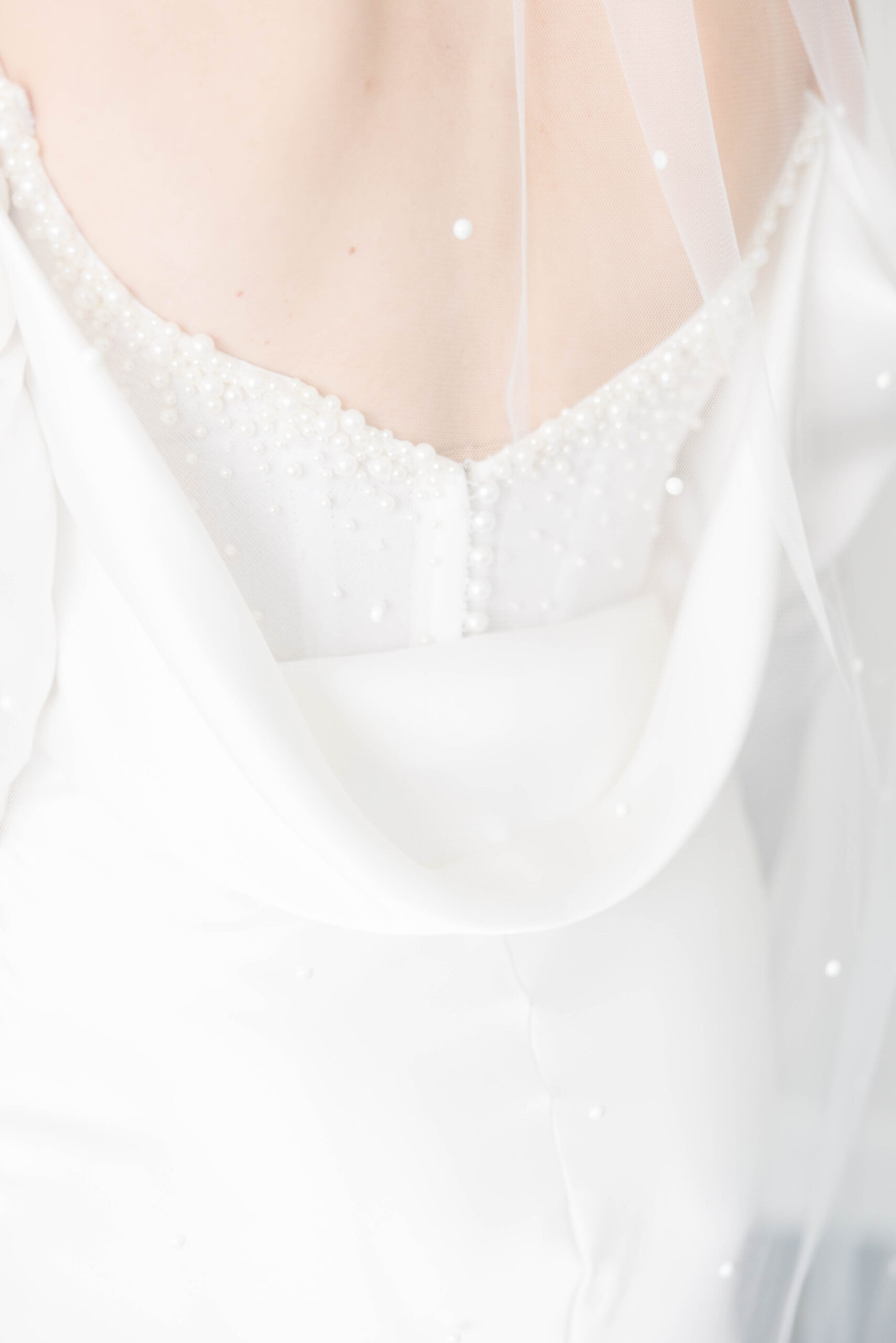 Newport Wedding Photographer and Videographer | Serving CT, RI, Massachusetts, and Surrounding New England Areas | Bridal gown and veil with pearls