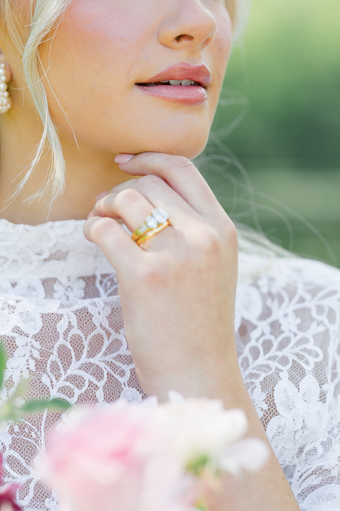 Connecticut Wedding Photographer and Wedding Videographer | Serving Newport, RI, and New England Areas | Close up of bride wearing an engagement ring