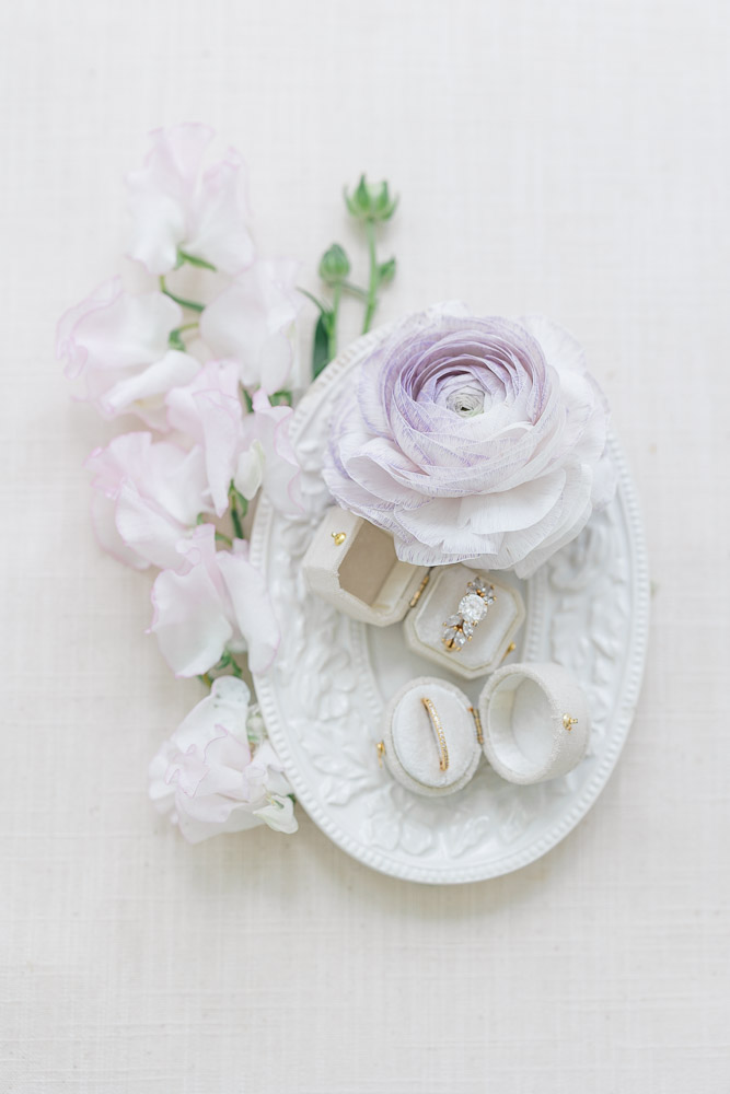 Wedding Photographer Newport RI and Wedding Videographer | Serving CT, RI, and New England Areas | Flat lay with white and hints of purple colors