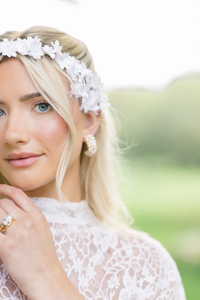 Newport Videographer and Wedding Photographer | Serving CT, RI, and New England Areas | Close up of bride with a floral head band