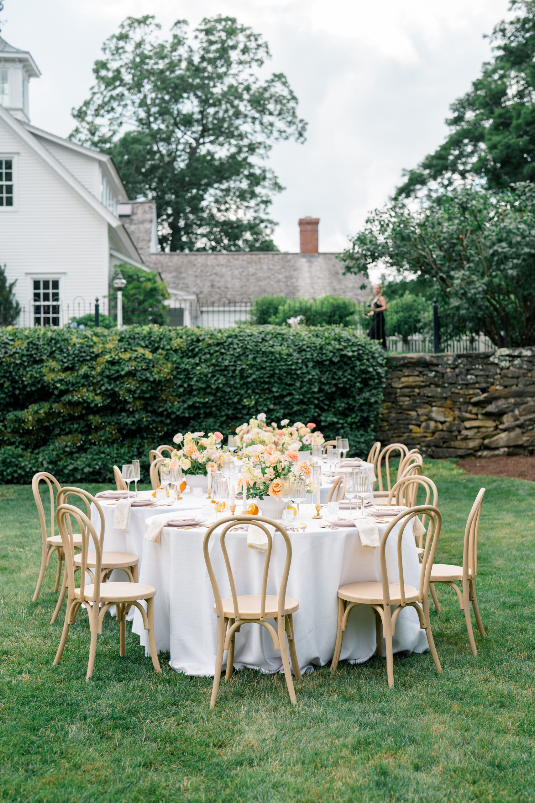 Outdoor garden wedding reception setup at Smith Farm Gardens in Connecticut
